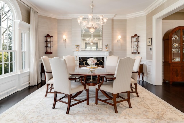 35 Club Rd, Greenwich, CT 06878 - dining space with a chandelier, wood finished floors, crown molding, and a decorative wall