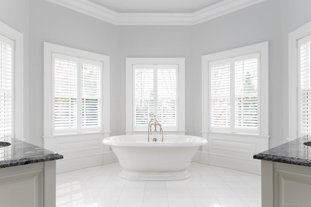 35 Club Rd, Greenwich, CT 06878 - bathroom featuring ornamental molding, a soaking tub, vanity, and a healthy amount of sunlight