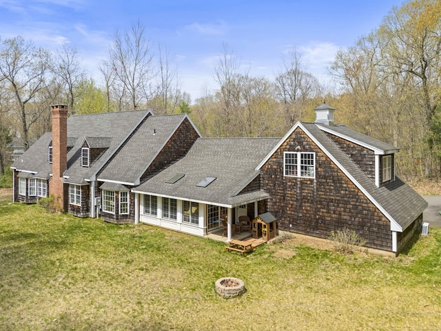 74 High St, Portland, CT 06480 - rear view of property with a lawn, a shingled roof, an outdoor fire pit, and a chimney