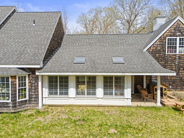 74 High St, Portland, CT 06480 - rear view of property featuring a shingled roof, a chimney, and a patio area