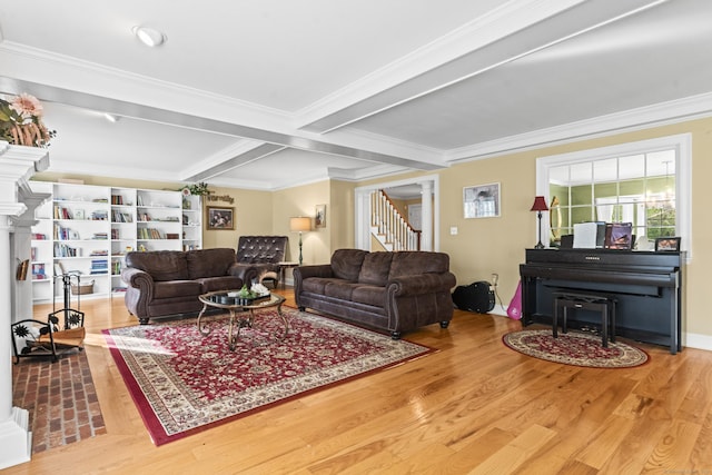 74 High St, Portland, CT 06480 - living room with decorative columns, ornamental molding, and stairway