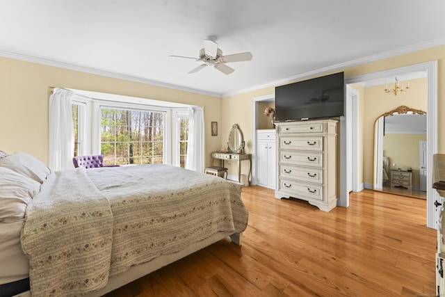74 High St, Portland, CT 06480 - bedroom with crown molding, ceiling fan with notable chandelier, and light wood finished floors