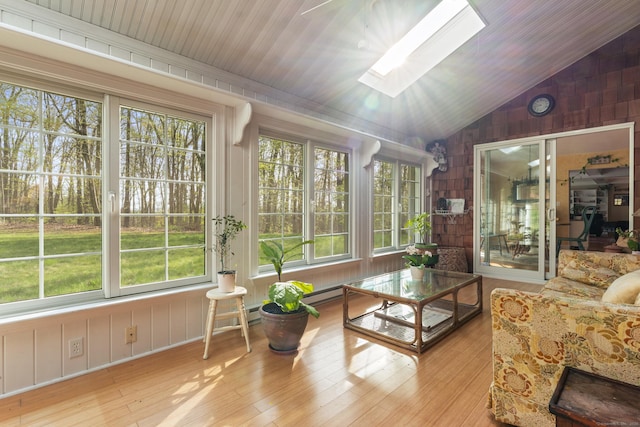 74 High St, Portland, CT 06480 - sunroom featuring plenty of natural light, wooden walls, wood finished floors, and vaulted ceiling with skylight