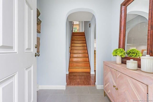 2851 Old Town Rd, Bridgeport, CT 06606 - stairs with tile patterned flooring and arched walkways