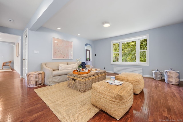 2851 Old Town Rd, Bridgeport, CT 06606 - living room with arched walkways, wood finished floors, and recessed lighting