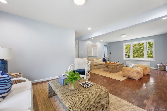 2851 Old Town Rd, Bridgeport, CT 06606 - living room with wood finished floors, arched walkways, and recessed lighting