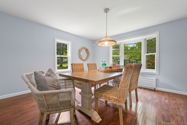 2851 Old Town Rd, Bridgeport, CT 06606 - dining space with baseboards and wood finished floors