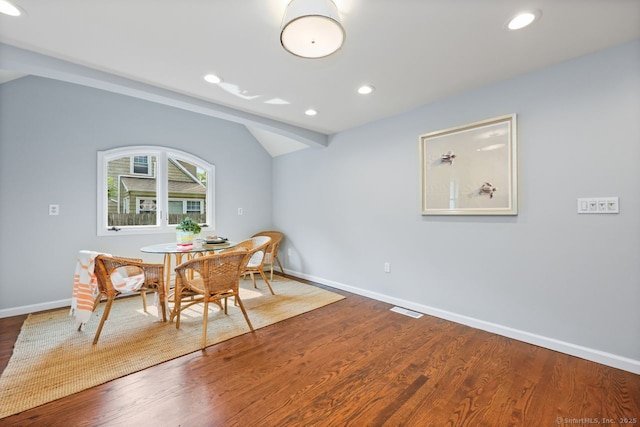 2851 Old Town Rd, Bridgeport, CT 06606 - dining space with wood finished floors, recessed lighting, and lofted ceiling