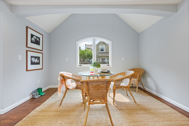 2851 Old Town Rd, Bridgeport, CT 06606 - dining area with dark wood-style floors and lofted ceiling