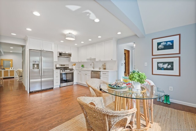 2851 Old Town Rd, Bridgeport, CT 06606 - dining area featuring wood finished floors and recessed lighting