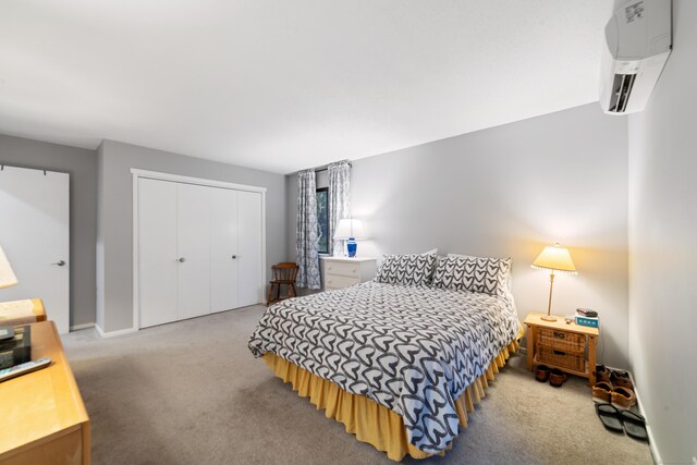 669 Heritage Vlg Unit B, Southbury, CT 06488 - carpeted bedroom featuring a wall unit AC and a closet