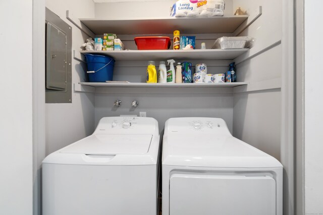 669 Heritage Vlg Unit B, Southbury, CT 06488 - laundry area featuring washing machine and clothes dryer, electric panel, and laundry area