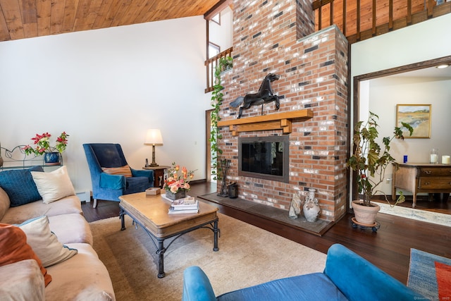 living room with a fireplace, wood finished floors, high vaulted ceiling, and wooden ceiling