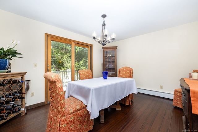 dining space featuring a notable chandelier, dark wood finished floors, baseboards, and a baseboard radiator