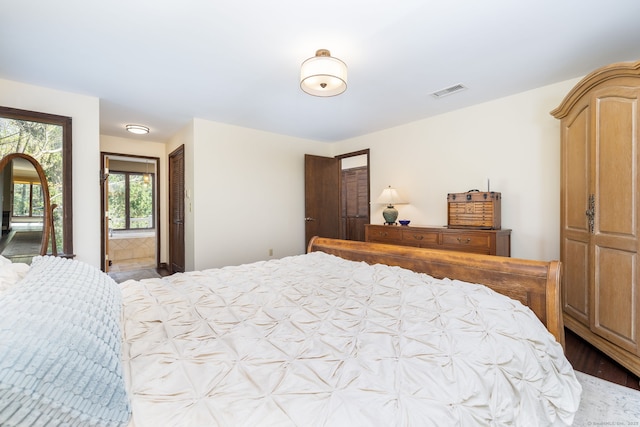bedroom featuring visible vents