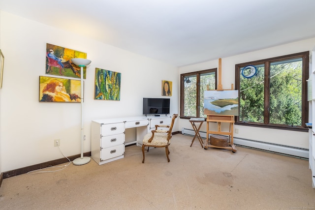 home office featuring baseboards and a baseboard radiator