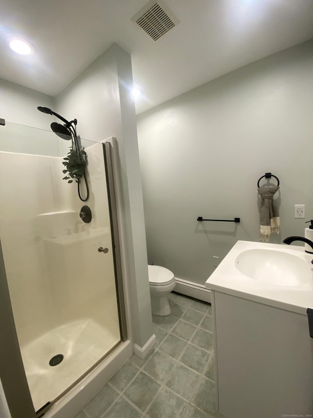 full bathroom with visible vents, a shower stall, vanity, a baseboard heating unit, and toilet