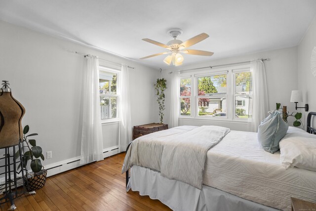 131 Vesper St, Fairfield, CT 06825 - bedroom with wood-type flooring, ceiling fan, and baseboard heating