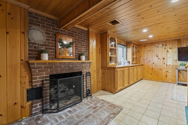 131 Vesper St, Fairfield, CT 06825 - unfurnished living room featuring wooden walls, recessed lighting, wood ceiling, and a fireplace