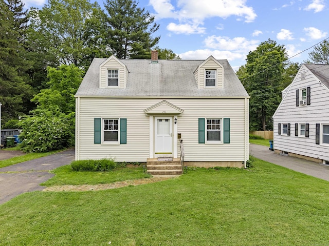 240 Barbara Rd, Middletown, CT 06457 - cape cod-style house featuring a front yard, a chimney, entry steps, and a shingled roof