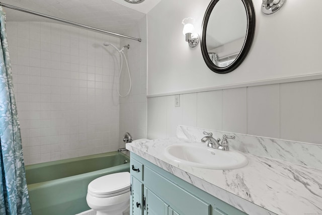 240 Barbara Rd, Middletown, CT 06457 - full bath featuring shower / tub combo with curtain, vanity, a decorative wall, and wainscoting
