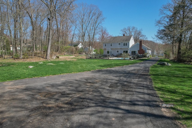 view of road featuring driveway