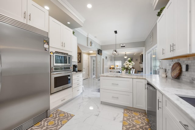 kitchen featuring built in appliances, a peninsula, crown molding, and white cabinets