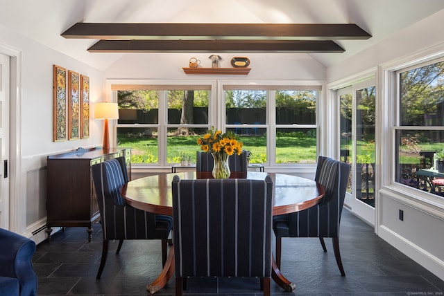 sunroom featuring a baseboard heating unit and beam ceiling