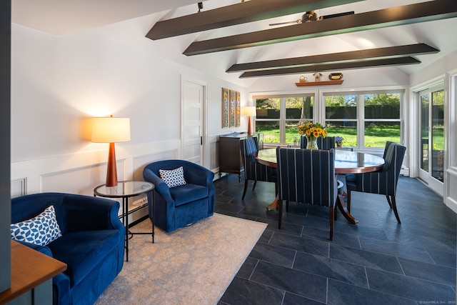 sunroom with vaulted ceiling with beams and a wainscoted wall