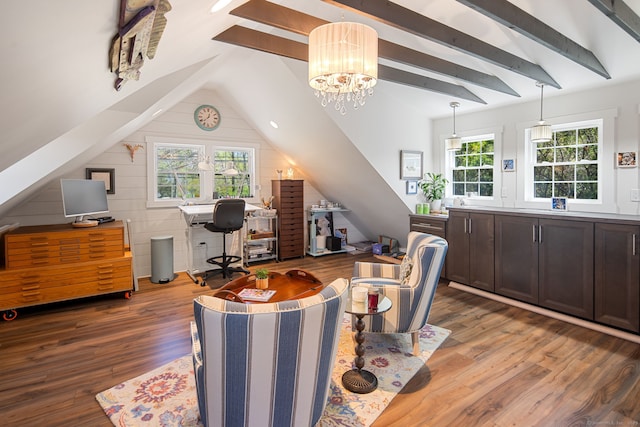 office featuring an inviting chandelier, vaulted ceiling with beams, and wood finished floors