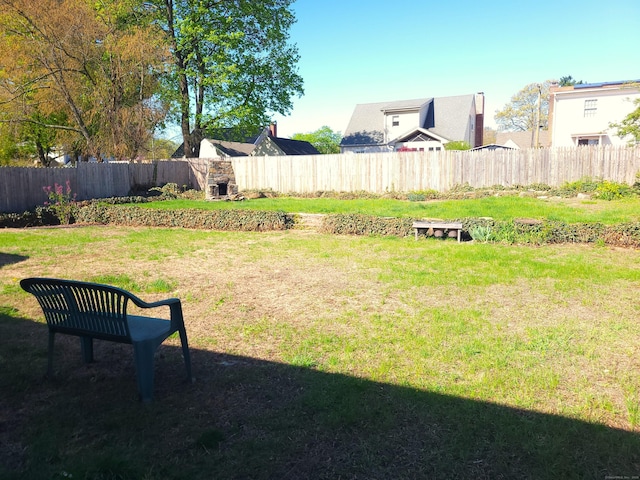 view of yard featuring a fenced backyard