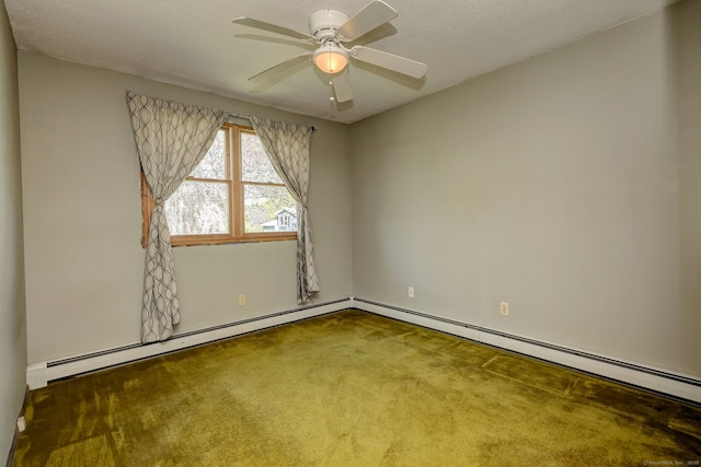 carpeted empty room featuring ceiling fan and a baseboard heating unit