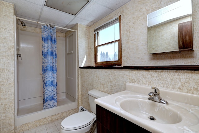 bathroom featuring vanity, a stall shower, and toilet