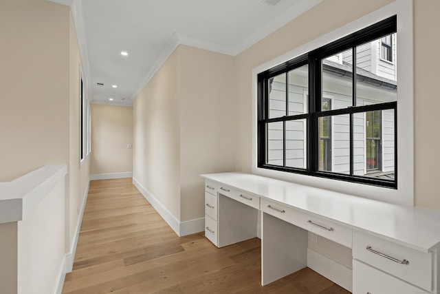 317 Park St, New Canaan, CT 06840 - hall with crown molding, light wood finished floors, and recessed lighting