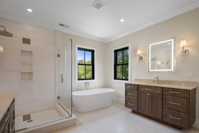 317 Park St, New Canaan, CT 06840 - full bath featuring vanity, a shower stall, a soaking tub, crown molding, and recessed lighting