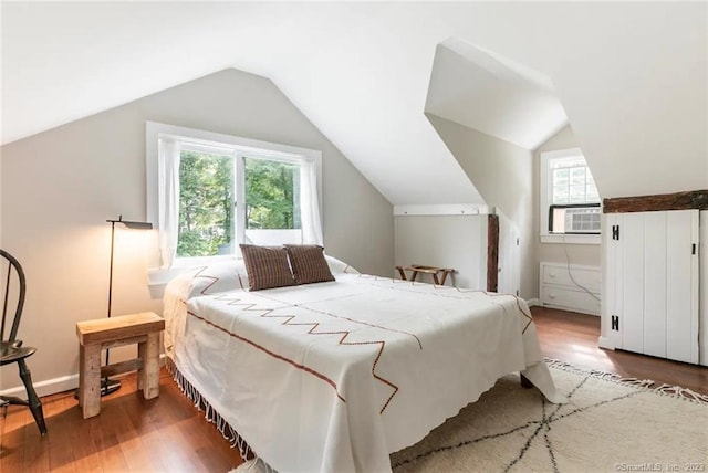 112 Easton Rd, Westport, CT 06880 - bedroom featuring cooling unit, wood finished floors, and vaulted ceiling
