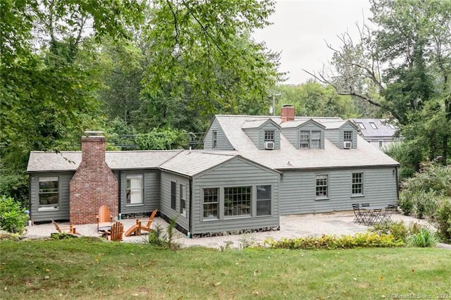 112 Easton Rd, Westport, CT 06880 - rear view of house with a chimney, a patio, and a yard