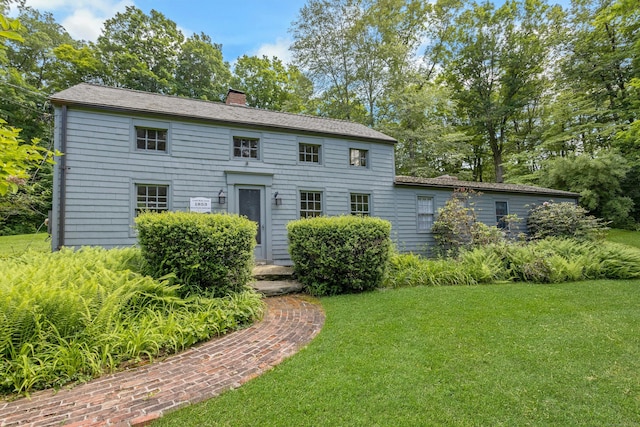 112 Easton Rd, Westport, CT 06880 - view of front of house featuring a chimney and a front yard