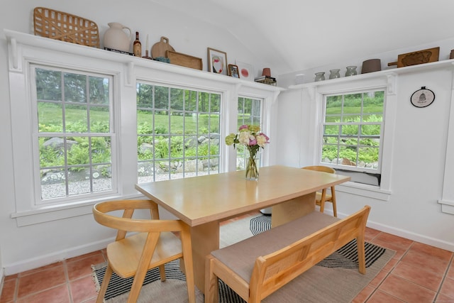 112 Easton Rd, Westport, CT 06880 - dining area with light tile patterned floors and lofted ceiling
