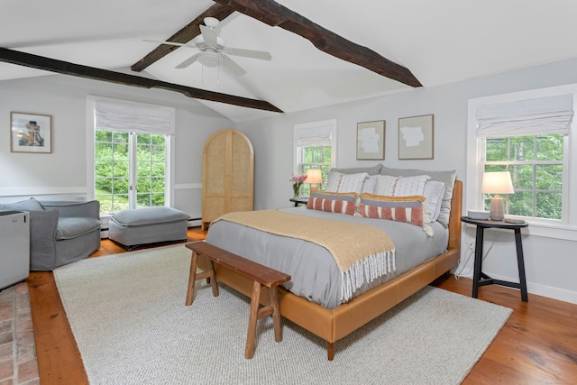 112 Easton Rd, Westport, CT 06880 - bedroom with wood finished floors, baseboard heating, multiple windows, and a ceiling fan