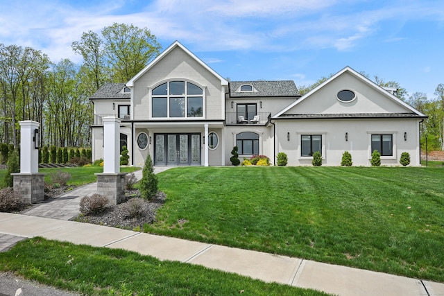 5 Hawks Lndg, Berlin, CT 06023 - view of front of home featuring french doors, a front lawn, and stucco siding