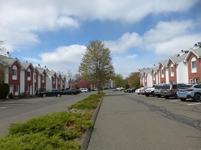 view of road with a residential view