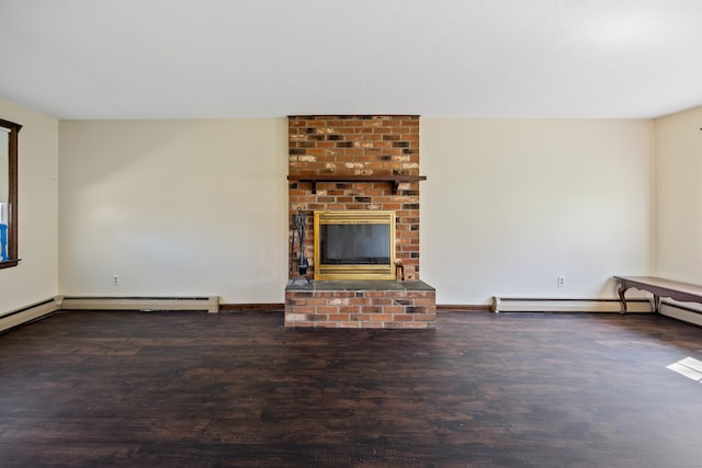 unfurnished living room featuring a baseboard radiator, a brick fireplace, and wood finished floors