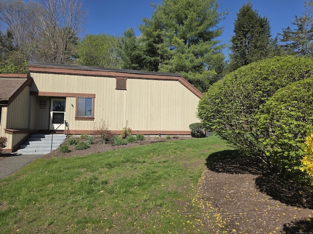 664C Heritage Vlg, Southbury, CT 06488 - view of side of home with a yard