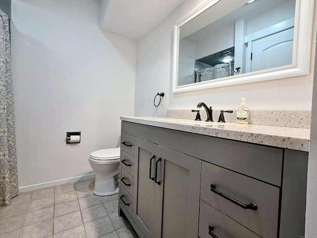 664C Heritage Vlg, Southbury, CT 06488 - bathroom featuring vanity, toilet, baseboards, tile patterned floors, and a shower with shower curtain