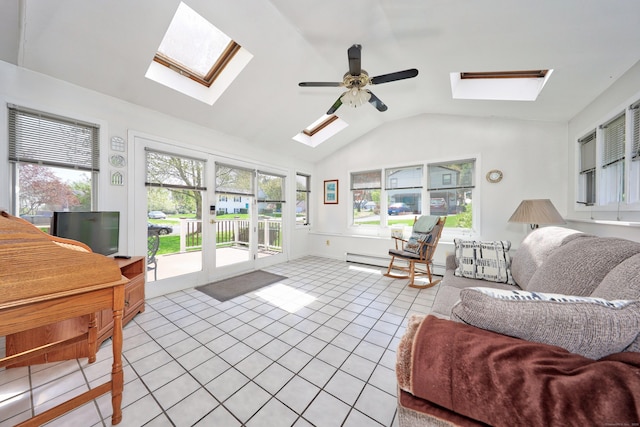living area featuring a ceiling fan, light tile patterned floors, vaulted ceiling with skylight, and baseboard heating