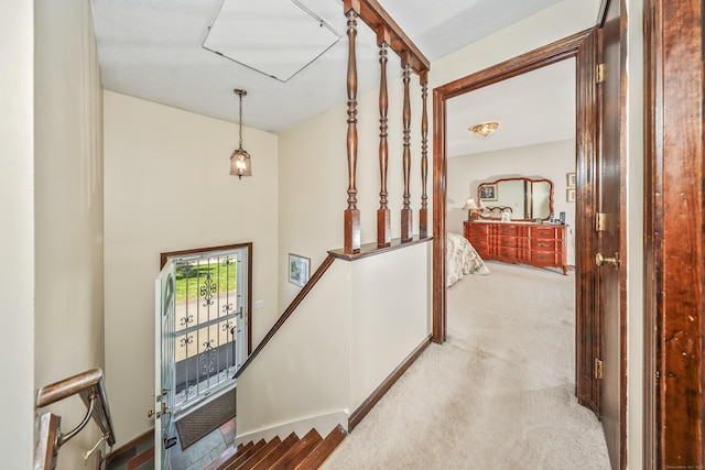 corridor featuring carpet flooring