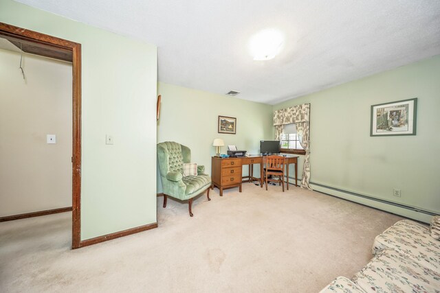 carpeted office featuring baseboards, visible vents, and a baseboard radiator
