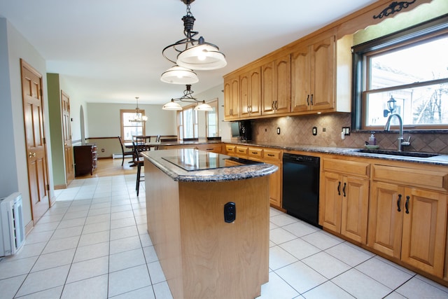 kitchen with a sink, decorative backsplash, light tile patterned floors, black appliances, and a kitchen island