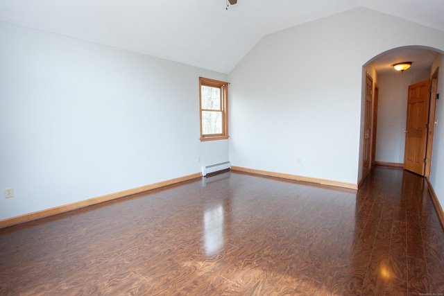 unfurnished room with arched walkways, a baseboard heating unit, lofted ceiling, and dark wood-type flooring